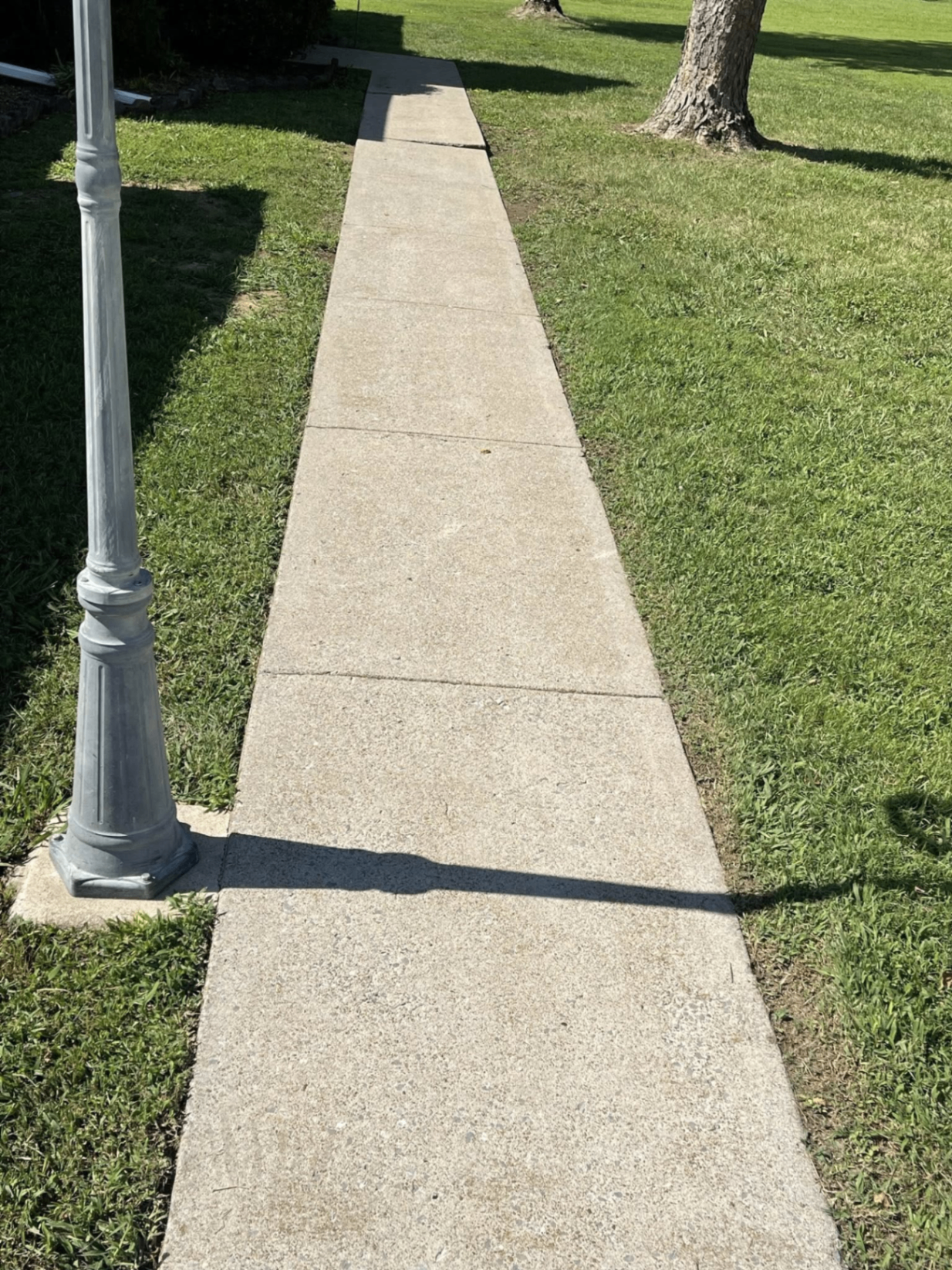 After — Sidewalk pressure wash