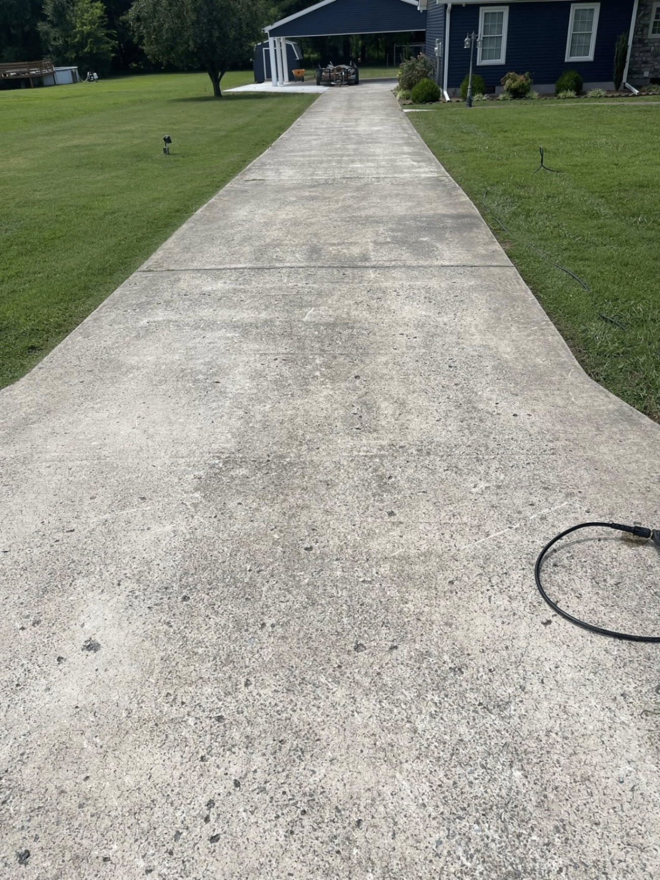 Before — Driveway pressure wash